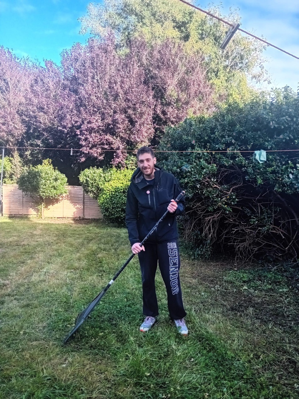 Gio gardening at the volunteers' house.