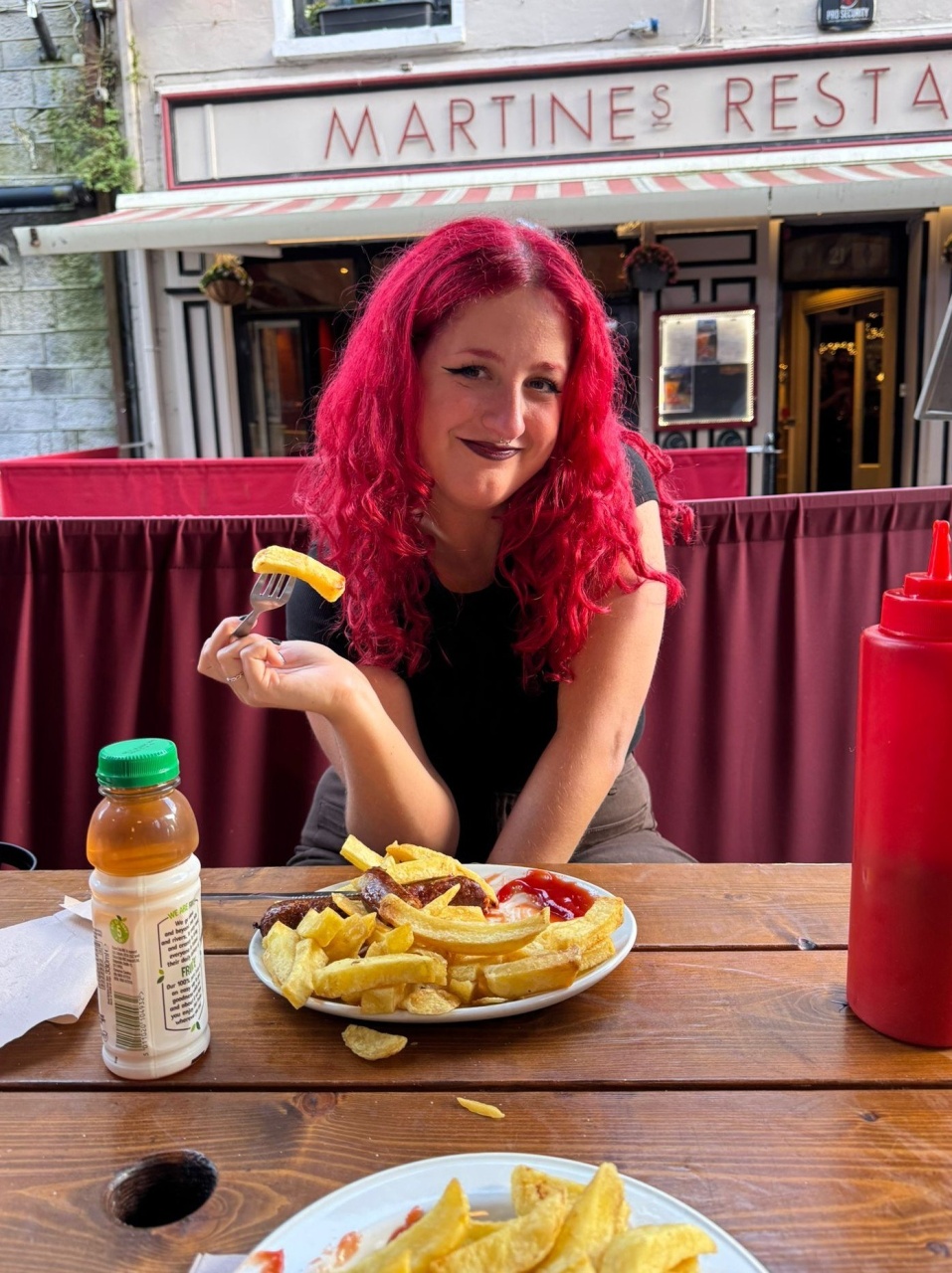 Julia having some fish and chips at Galway city center