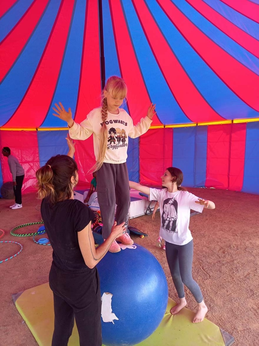 Balancing Globe in the tent Galway Circus New Horizon partnership